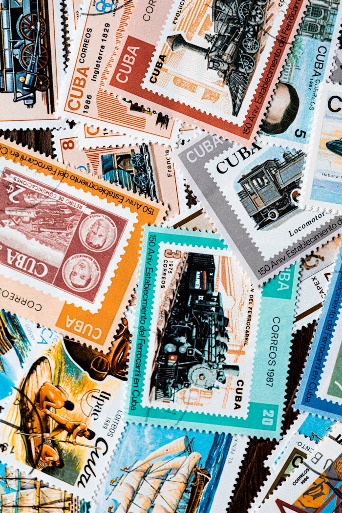 An artistic array of Cuban postage stamps featuring vintage designs and historical themes.